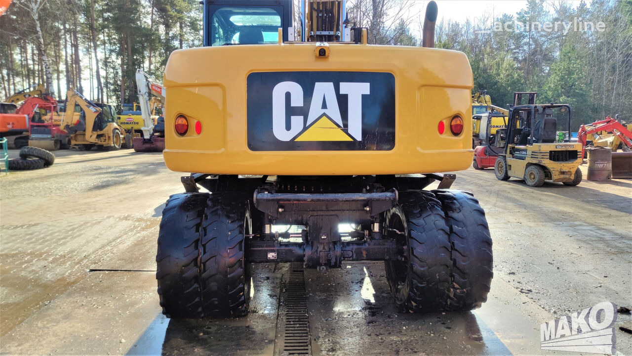 Wheel excavator Caterpillar M313D: picture 3