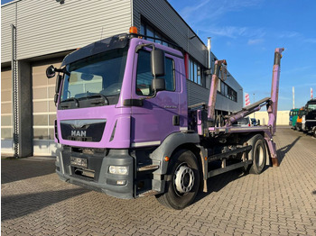 Skip loader truck MAN TGM