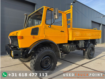 Dropside/ Flatbed truck UNIMOG U1300