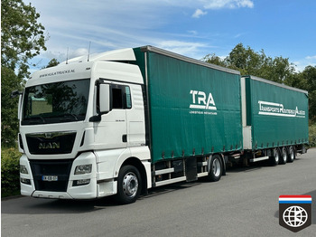 Curtain side truck MAN TGX 18.440