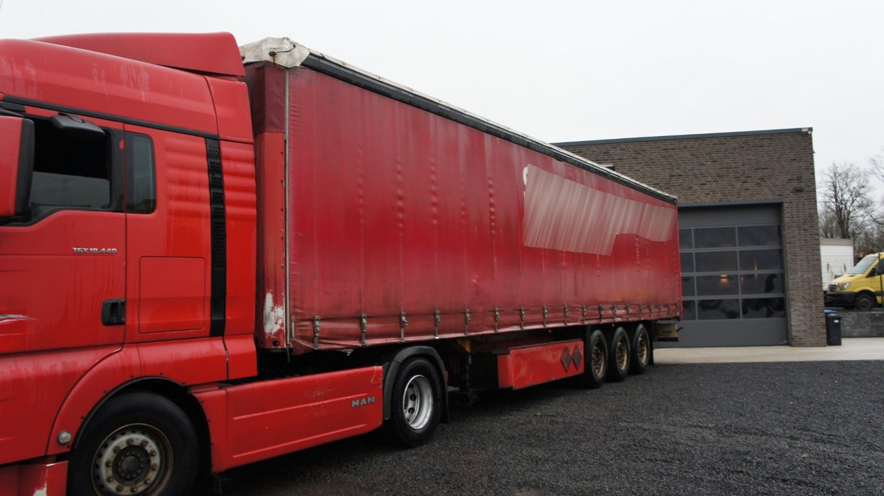 Schmitz Cargobull S01 Pritsche + Plane SAF-Achsen - Curtainsider semi-trailer: picture 1 Schmitz Cargobull S01 Pritsche + Plane SAF-Achsen - Curtainsider semi-trailer: picture 1