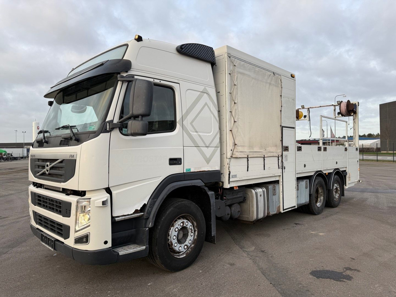 Volvo FM 410 6x2 Euro 5 - Dropside/ Flatbed truck: picture 1 Volvo FM 410 6x2 Euro 5 - Dropside/ Flatbed truck: picture 1