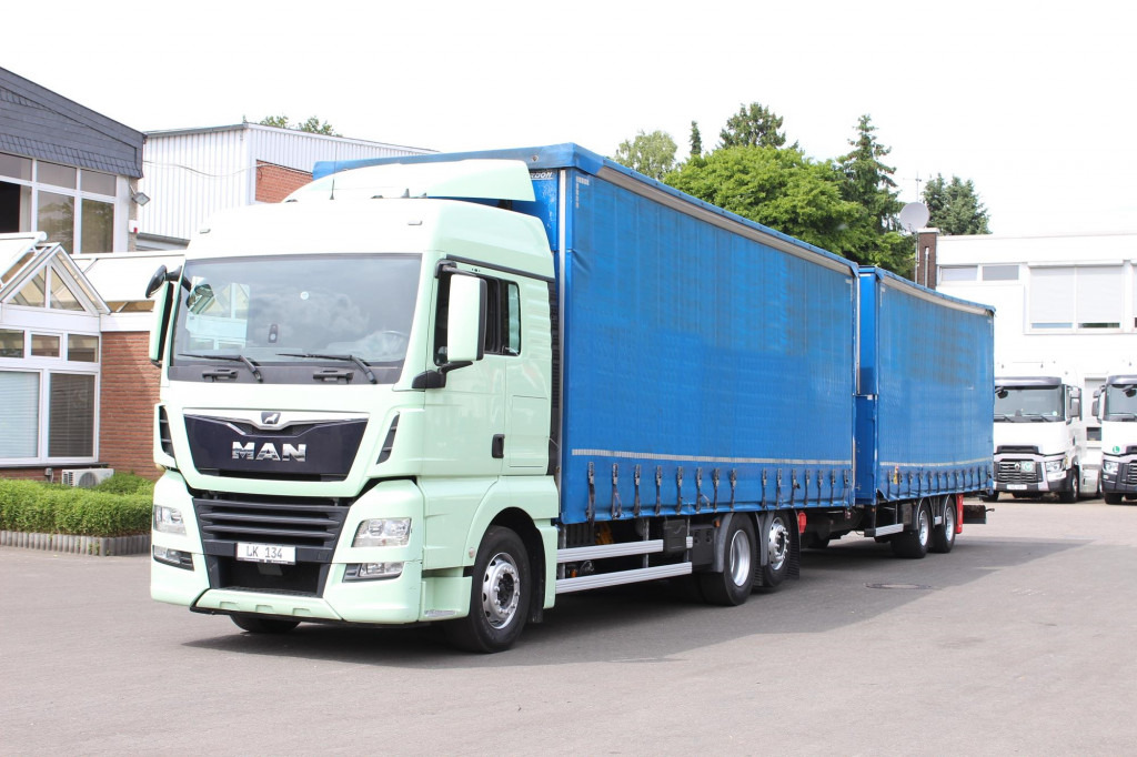 MAN TGX26.460 Durchlad Plane-Jumbo Retarder Hubdach - Curtain side truck: picture 1 MAN TGX26.460 Durchlad Plane-Jumbo Retarder Hubdach - Curtain side truck: picture 1