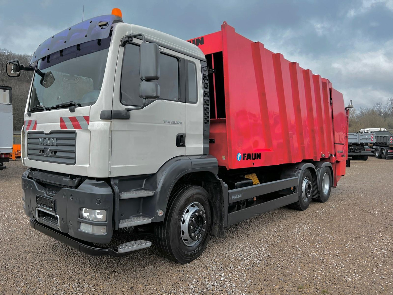 MAN TGA 26.320 6x2 Faun Powerpress - Garbage truck: picture 1 MAN TGA 26.320 6x2 Faun Powerpress - Garbage truck: picture 1