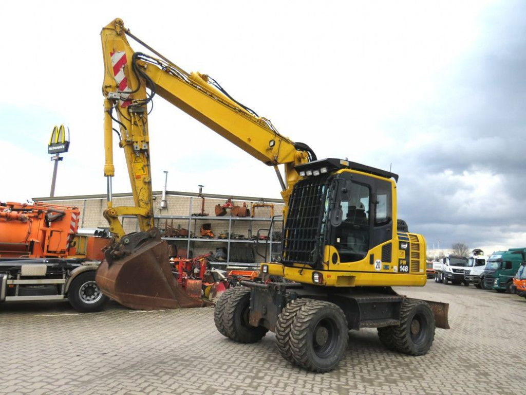 Komatsu Mobilbagger PW 148 - 8 Bagger 6.824h Deutsch top - Wheel excavator: picture 1 Komatsu Mobilbagger PW 148 - 8 Bagger 6.824h Deutsch top - Wheel excavator: picture 1