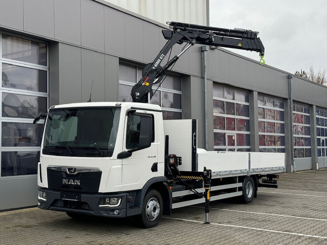 MAN TGL 12.190 4x2 BL TGL 12.190 4x2 BL mit Kran Hiab Hiduo 072DS-4 - Crane truck: picture 1 MAN TGL 12.190 4x2 BL TGL 12.190 4x2 BL mit Kran Hiab Hiduo 072DS-4 - Crane truck: picture 1
