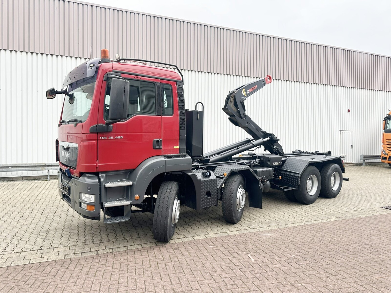 MAN TGS 35.480 8X4 BL TGS 35.400 8x4 BL, Schub-Knick bis 6,5m Container - Hook lift truck: picture 1 MAN TGS 35.480 8X4 BL TGS 35.400 8x4 BL, Schub-Knick bis 6,5m Container - Hook lift truck: picture 1