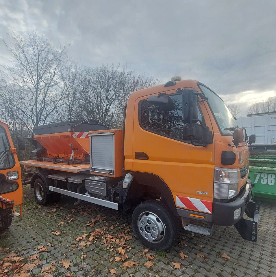 Mitsubishi Canter Fuso 6C18 4x4 Canter Fuso 6C18 4x4, Winterdienstausstattung, AJK HL 5-3.150 City-Abroller - Hook lift truck: picture 1 Mitsubishi Canter Fuso 6C18 4x4 Canter Fuso 6C18 4x4, Winterdienstausstattung, AJK HL 5-3.150 City-Abroller - Hook lift truck: picture 1