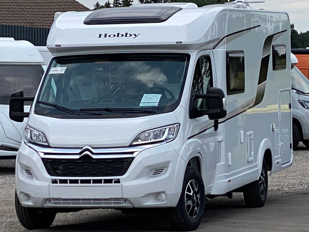 Hobby Optima Ontour Edition V65 GE Navi Markise SAT - Semi-integrated motorhome: picture 1 Hobby Optima Ontour Edition V65 GE Navi Markise SAT - Semi-integrated motorhome: picture 1