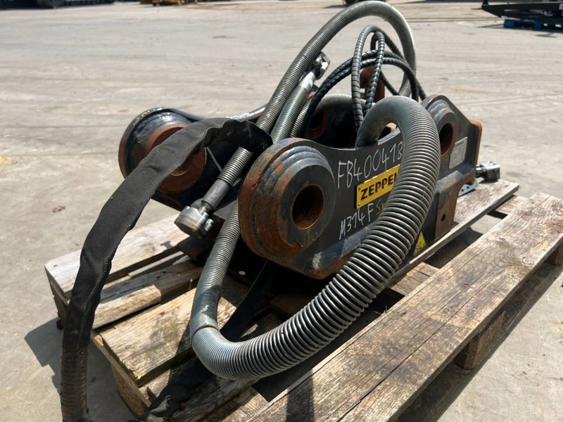 OilQuick OQ65 - M314F / M316F / M318F - Quick coupler for Construction machinery: picture 5 OilQuick OQ65 - M314F / M316F / M318F - Quick coupler for Construction machinery: picture 5