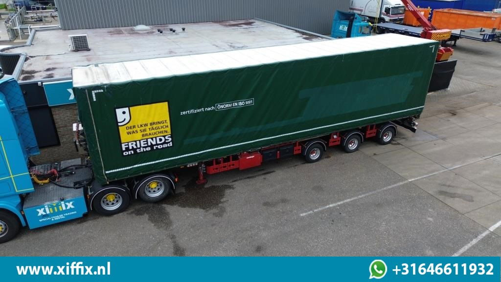 Meusburger 3-ass. Vlakke dubbel 2x uitschuifbare oplegger met huifopbouw / 3x gestuurd - Dropside/ Flatbed semi-trailer: picture 1 Meusburger 3-ass. Vlakke dubbel 2x uitschuifbare oplegger met huifopbouw / 3x gestuurd - Dropside/ Flatbed semi-trailer: picture 1