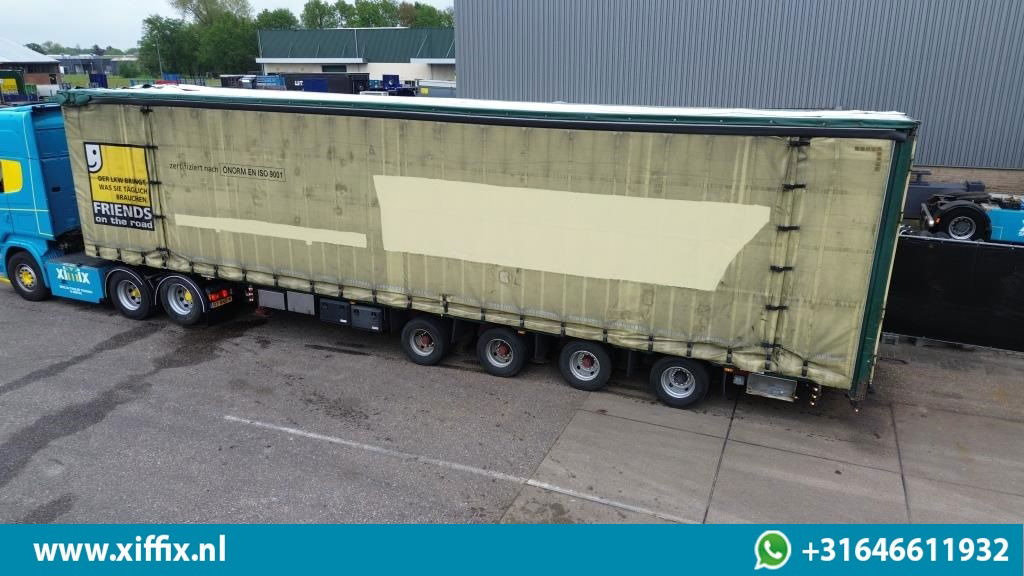 Meusburger 4-ass. Vlakke Mega oplegger met elektrische huifopbouw / 2x naloop gestuurd - Dropside/ Flatbed semi-trailer: picture 2 Meusburger 4-ass. Vlakke Mega oplegger met elektrische huifopbouw / 2x naloop gestuurd - Dropside/ Flatbed semi-trailer: picture 2