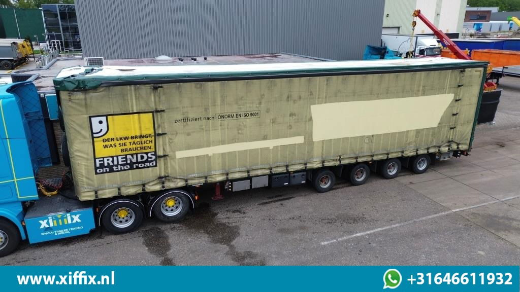 Meusburger 4-ass. Vlakke Mega oplegger met elektrische huifopbouw / 2x naloop gestuurd - Dropside/ Flatbed semi-trailer: picture 1 Meusburger 4-ass. Vlakke Mega oplegger met elektrische huifopbouw / 2x naloop gestuurd - Dropside/ Flatbed semi-trailer: picture 1