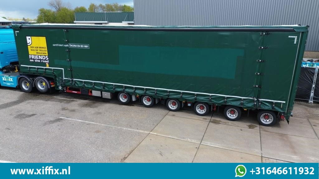 Meusburger 6-ass. Semi dieplader met elektische huifopbouw / 3x naloop gestuurd - Low loader semi-trailer: picture 2 Meusburger 6-ass. Semi dieplader met elektische huifopbouw / 3x naloop gestuurd - Low loader semi-trailer: picture 2