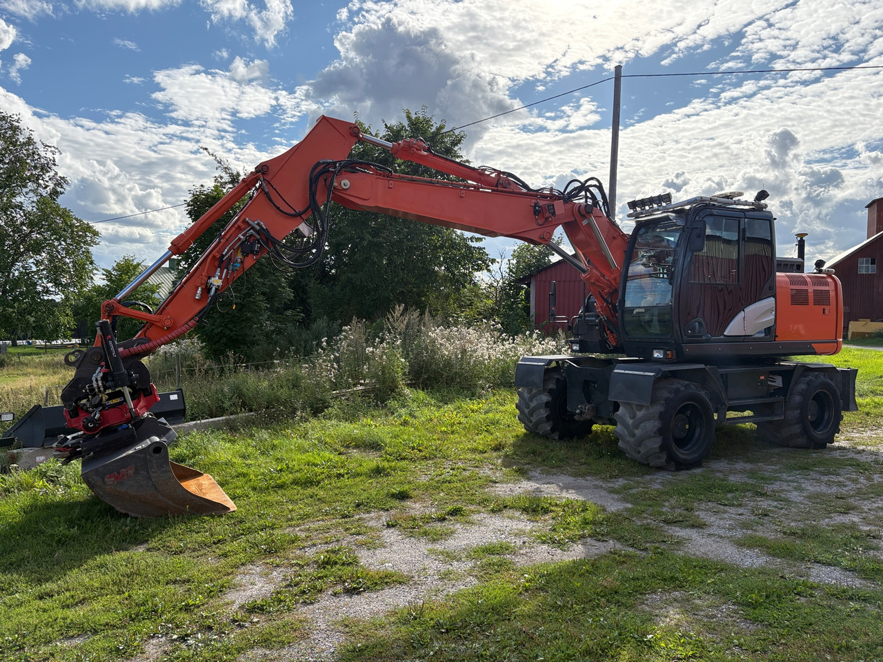 Hitachi ZX140W-6 - Excavator: picture 1 Hitachi ZX140W-6 - Excavator: picture 1