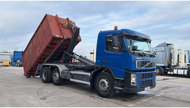 Volvo FM 9 - 300 (BELGIAN TRUCK / CAMION BELGE / INCL CONTAINER / 6X2 / GOOD TYRES) - Hook lift truck: picture 2 Volvo FM 9 - 300 (BELGIAN TRUCK / CAMION BELGE / INCL CONTAINER / 6X2 / GOOD TYRES) - Hook lift truck: picture 2