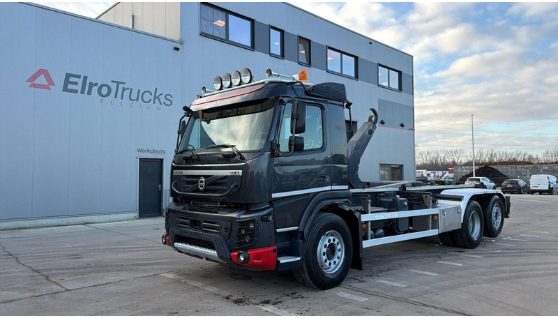 Volvo FMX 460 (EURO 5 EEV / 25T HOOK / BELGIAN TRUCK / 6X2 / RETARDER / STEERINGAXLE / STUURAS) - Hook lift truck: picture 1 Volvo FMX 460 (EURO 5 EEV / 25T HOOK / BELGIAN TRUCK / 6X2 / RETARDER / STEERINGAXLE / STUURAS) - Hook lift truck: picture 1
