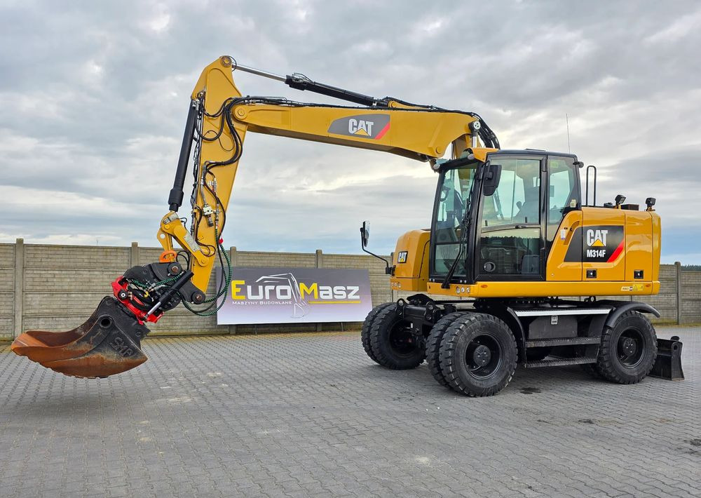 Caterpillar M314F, 2016 ROK, GŁOWICA ROTOTILT, 4400 MTH - Wheel excavator: picture 1 Caterpillar M314F, 2016 ROK, GŁOWICA ROTOTILT, 4400 MTH - Wheel excavator: picture 1