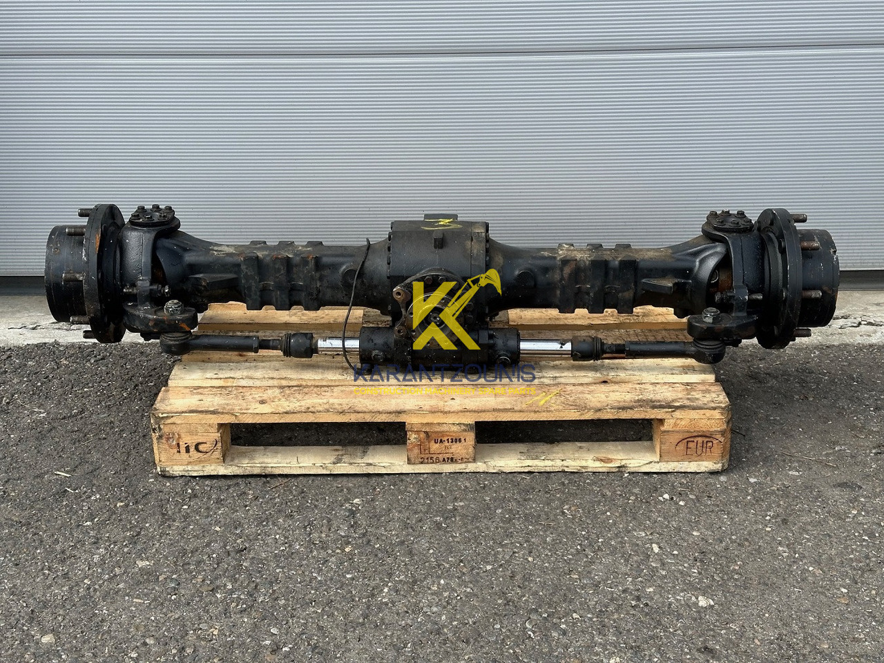 Dana Spicer Vorderachse-Planetenachse Typ:211/233-004. Kramer-Nr.1000304468. Ratio:1/13,714 #1000304468.03# - Axle and parts for Loader: picture 1 Dana Spicer Vorderachse-Planetenachse Typ:211/233-004. Kramer-Nr.1000304468. Ratio:1/13,714 #1000304468.03# - Axle and parts for Loader: picture 1