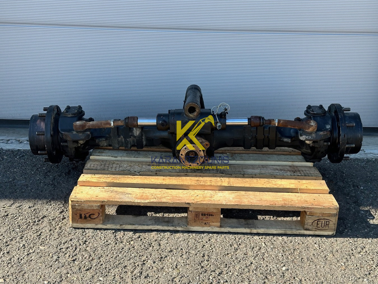 Dana Spicer Vorderachse-Planetenachse Typ:211/233-004. Kramer-Nr.1000304468. Ratio:1/13,714 #1000304468.04# - Axle and parts for Loader: picture 1 Dana Spicer Vorderachse-Planetenachse Typ:211/233-004. Kramer-Nr.1000304468. Ratio:1/13,714 #1000304468.04# - Axle and parts for Loader: picture 1