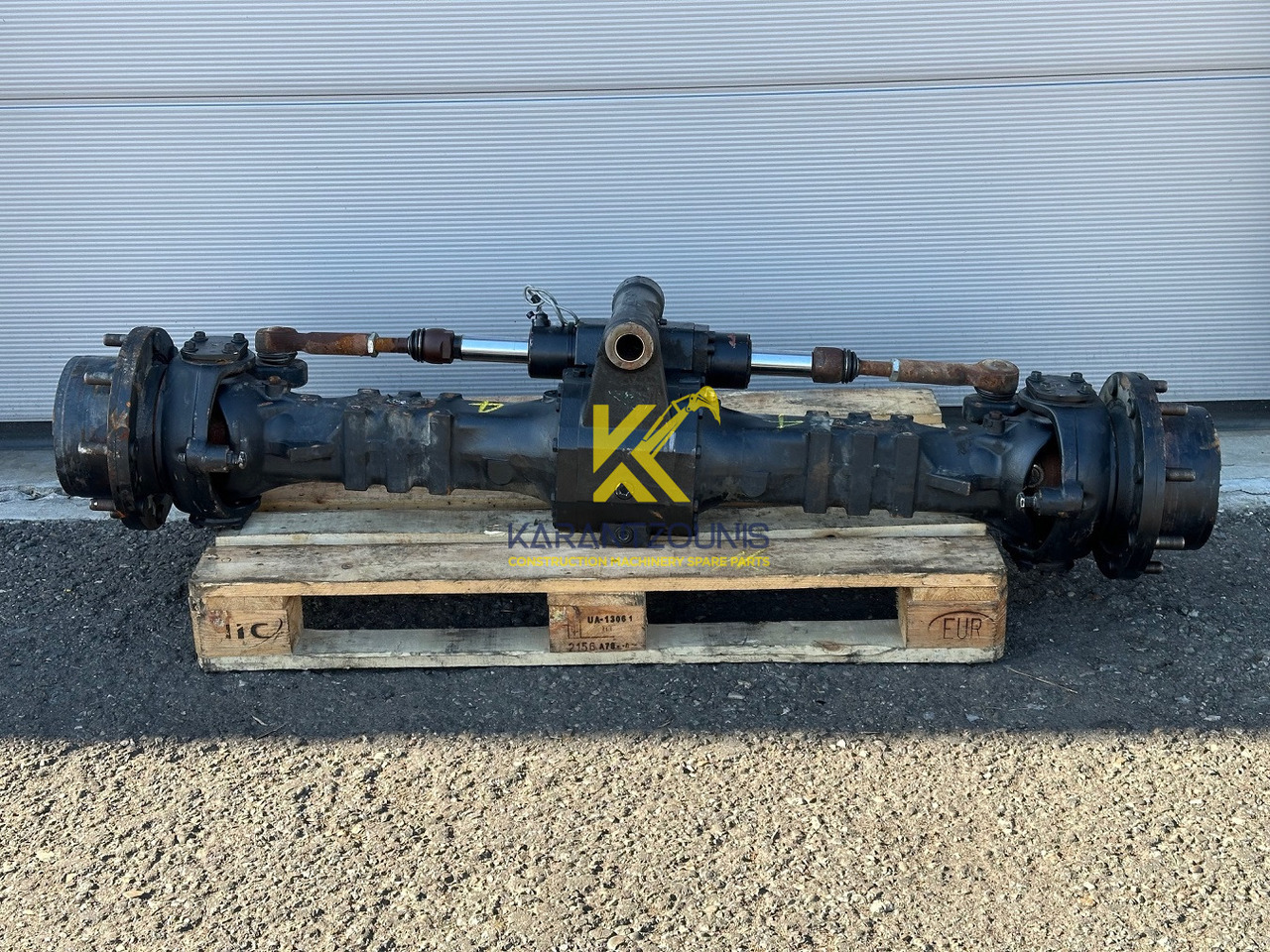Dana Spicer Vorderachse-Planetenachse Typ:211/233-004. Kramer-Nr.1000304468. Ratio:1/13,714 #1000304468.04# - Axle and parts for Loader: picture 4 Dana Spicer Vorderachse-Planetenachse Typ:211/233-004. Kramer-Nr.1000304468. Ratio:1/13,714 #1000304468.04# - Axle and parts for Loader: picture 4