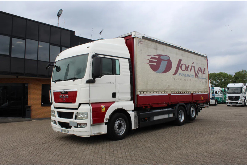 MAN TGX 26.440 * EURO5 * 6X2 * LIFT AXLE * - Curtain side truck: picture 2 MAN TGX 26.440 * EURO5 * 6X2 * LIFT AXLE * - Curtain side truck: picture 2