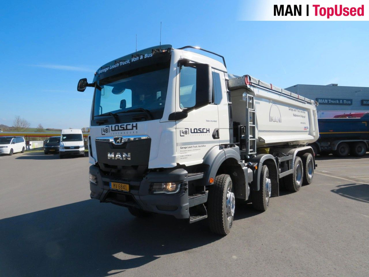 MAN TGS 41.480 8x4 BB CH Schmitz Muldenkipper Klima - Skip loader truck: picture 2 MAN TGS 41.480 8x4 BB CH Schmitz Muldenkipper Klima - Skip loader truck: picture 2