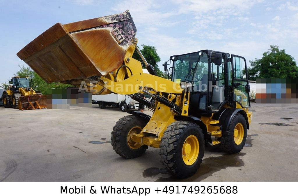 CAT 908 M *Schaufel/Gabel/Schnellwechsler - Wheel loader: picture 1 CAT 908 M *Schaufel/Gabel/Schnellwechsler - Wheel loader: picture 1