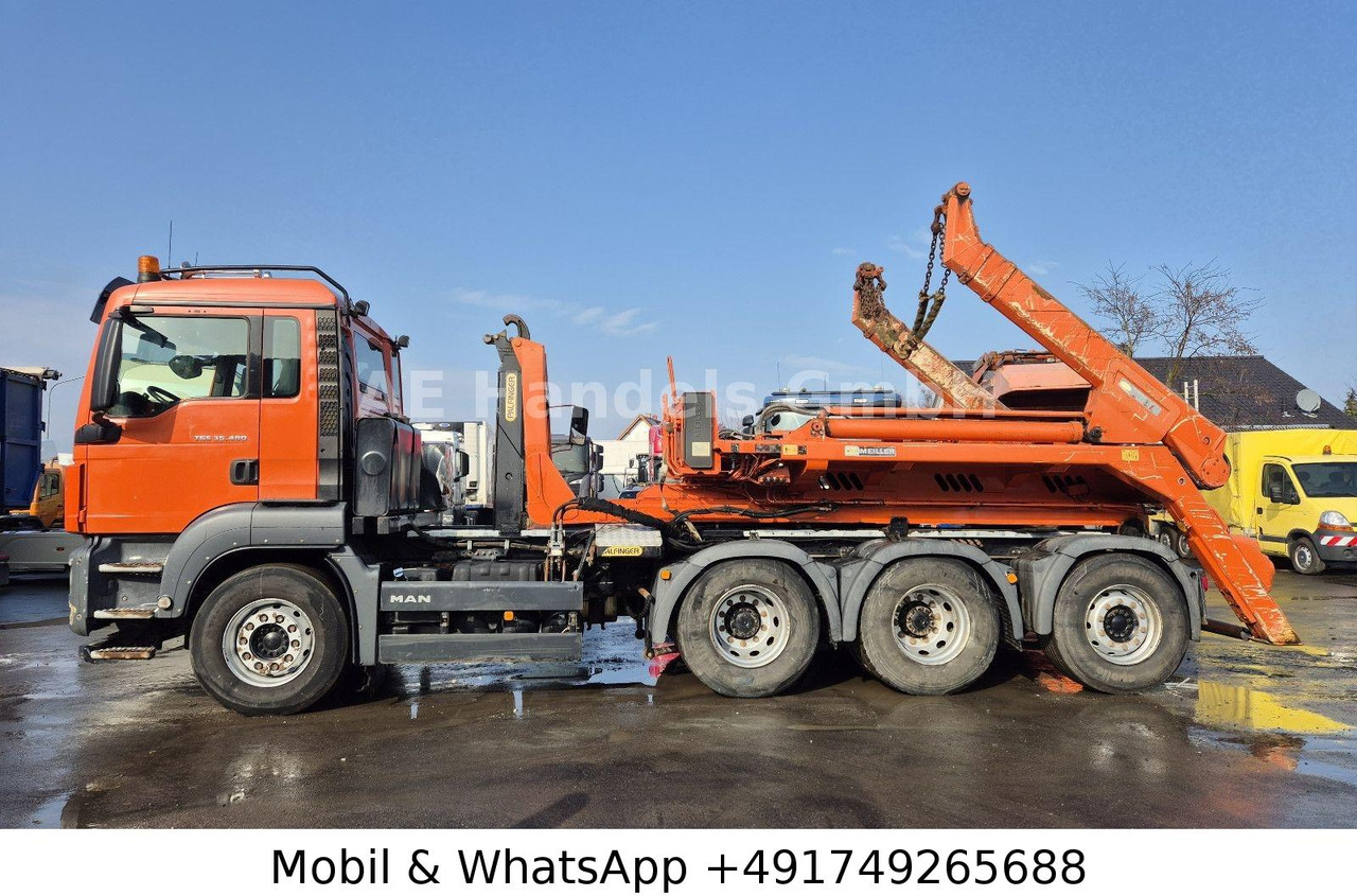 MAN TGS 35.480 M BL 8x4 *Intarder/Palfinger-T26 MAN TGS 35.480 M BL 8x4 *Intarder/Palfinger-T26 - Hook lift truck: picture 2 MAN TGS 35.480 M BL 8x4 *Intarder/Palfinger-T26 MAN TGS 35.480 M BL 8x4 *Intarder/Palfinger-T26 - Hook lift truck: picture 2
