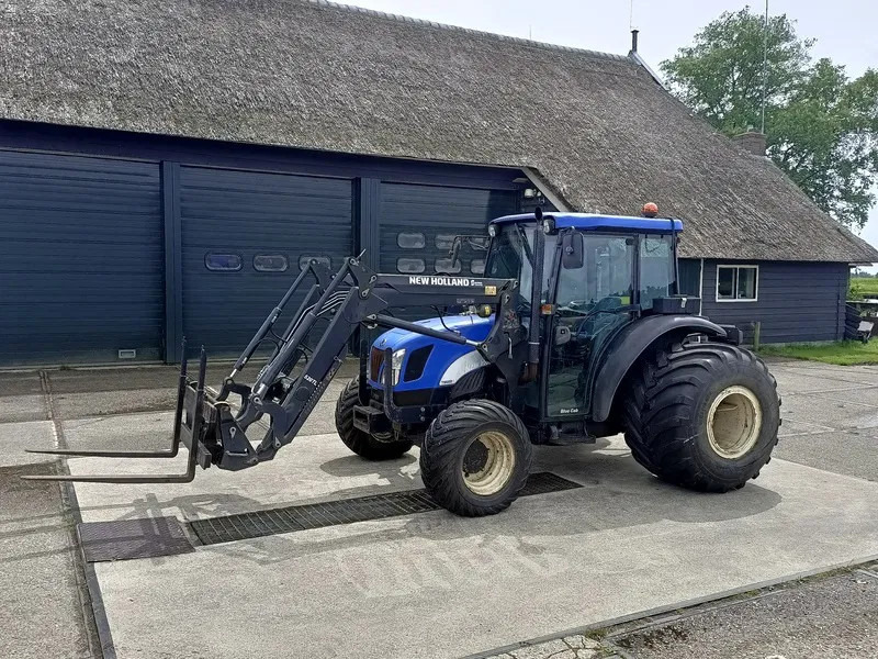 New Holland TN60DA TN60D met voorlader 520TL en vork - Farm tractor: picture 1 New Holland TN60DA TN60D met voorlader 520TL en vork - Farm tractor: picture 1