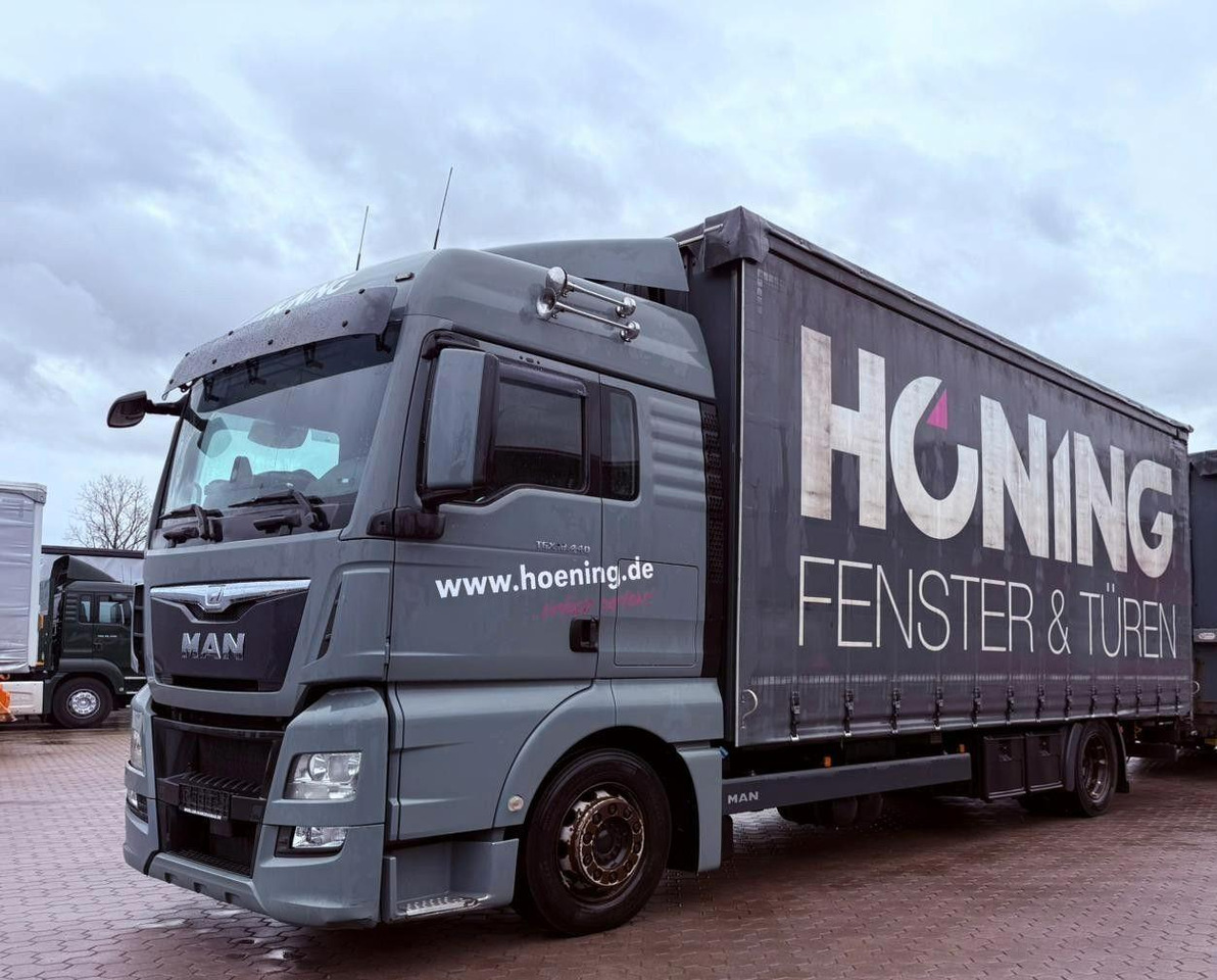 MAN TGX 18.440 LL Volumen LKW mit Staplerhalterung MAN TGX 18.440 LL Volumen LKW mit Staplerhalterung - Curtain side truck: picture 1 MAN TGX 18.440 LL Volumen LKW mit Staplerhalterung MAN TGX 18.440 LL Volumen LKW mit Staplerhalterung - Curtain side truck: picture 1