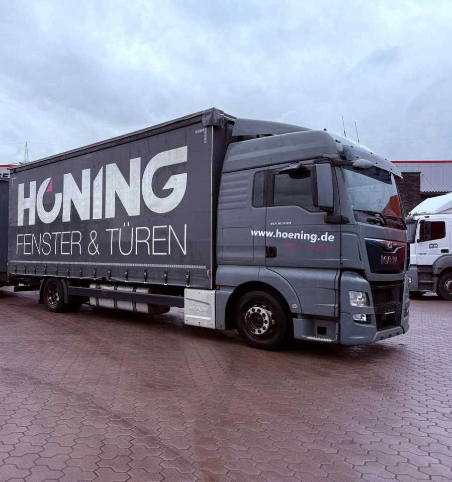 MAN TGX 18.440 LL Volumen LKW mit Staplerhalterung MAN TGX 18.440 LL Volumen LKW mit Staplerhalterung - Curtain side truck: picture 1 MAN TGX 18.440 LL Volumen LKW mit Staplerhalterung MAN TGX 18.440 LL Volumen LKW mit Staplerhalterung - Curtain side truck: picture 1