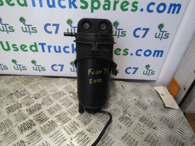 MITSUBISHI FUSO / CANTER FUEL FILTER HOUSING MK666099 - Engine and parts for Truck: picture 1 MITSUBISHI FUSO / CANTER FUEL FILTER HOUSING MK666099 - Engine and parts for Truck: picture 1