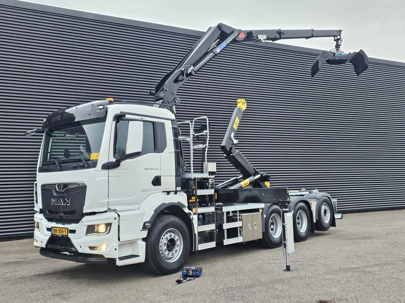 MAN TGS 35.470 8x4 / HMF 2243 Z KRAAN + HAAKARM - Hook lift truck, Crane truck: picture 1 MAN TGS 35.470 8x4 / HMF 2243 Z KRAAN + HAAKARM - Hook lift truck, Crane truck: picture 1