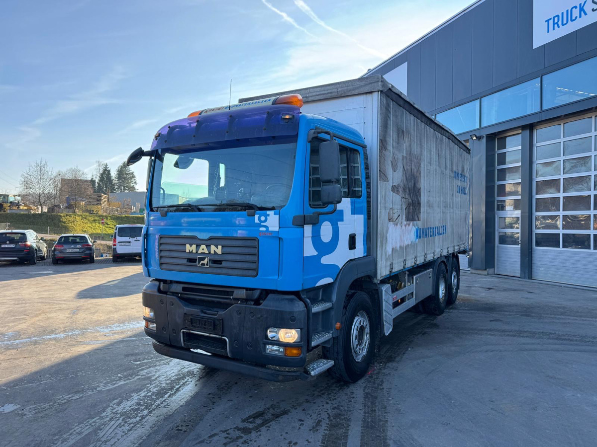 MAN TGA 26.440 6x2 - Curtain side truck: picture 1 MAN TGA 26.440 6x2 - Curtain side truck: picture 1