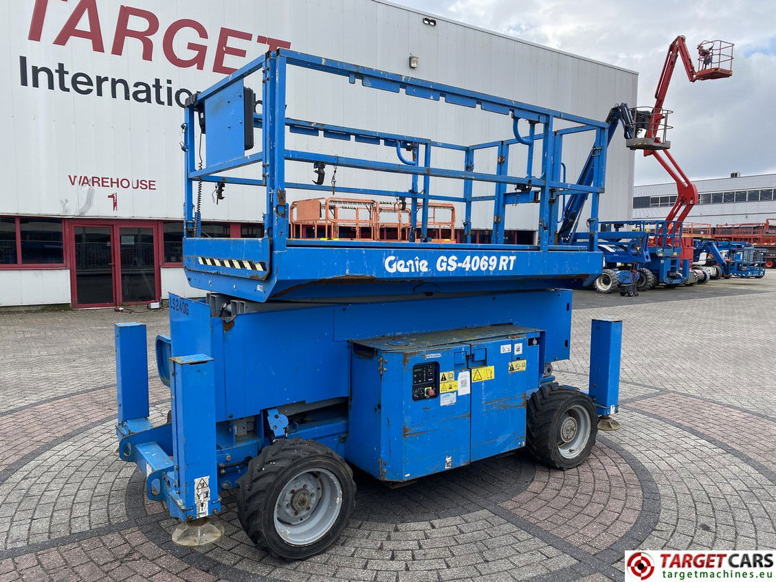 GENIE GS-4069RT LPG SCISSOR WORK LIFT GS4069 W/JACKLEGS 1412CM 11-11 1443HRS - Scissor lift: picture 1 GENIE GS-4069RT LPG SCISSOR WORK LIFT GS4069 W/JACKLEGS 1412CM 11-11 1443HRS - Scissor lift: picture 1