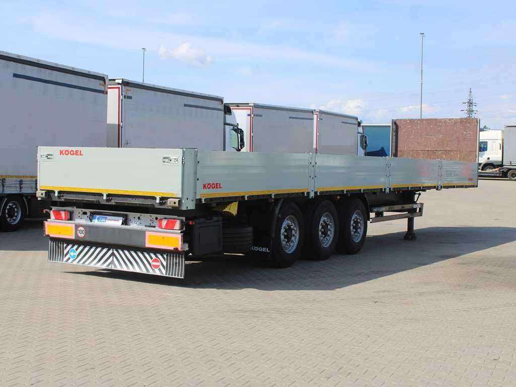 Kögel SN 24, LIFTING AXLE, MULTILOCK, SIDEWALLS - Dropside/ Flatbed semi-trailer: picture 3 Kögel SN 24, LIFTING AXLE, MULTILOCK, SIDEWALLS - Dropside/ Flatbed semi-trailer: picture 3