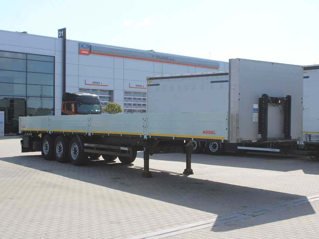 Kögel SN 24, LIFTING AXLE, MULTILOCK, SIDEWALLS - Dropside/ Flatbed semi-trailer: picture 2 Kögel SN 24, LIFTING AXLE, MULTILOCK, SIDEWALLS - Dropside/ Flatbed semi-trailer: picture 2