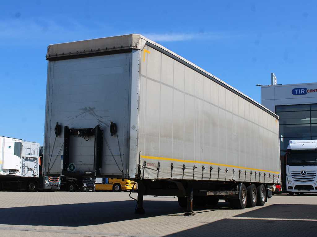 Kögel SN 24 MEGA, SAF, LOWDECK, LIFT AXLE, LIFTING ROOF, MULTILOCK - Curtainsider semi-trailer: picture 1 Kögel SN 24 MEGA, SAF, LOWDECK, LIFT AXLE, LIFTING ROOF, MULTILOCK - Curtainsider semi-trailer: picture 1
