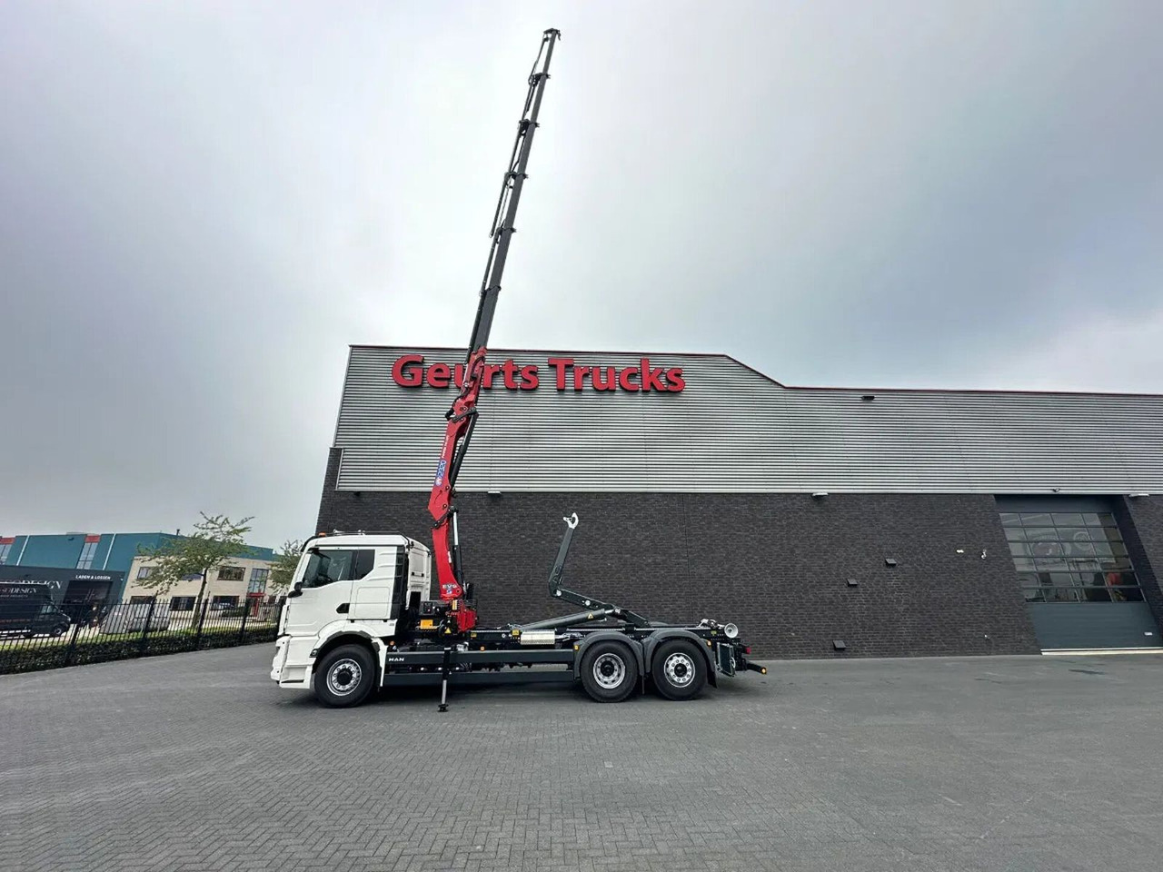 MAN TGS 26.520 6X4H-4 BL NEW MODEL + MEILLER HAAKARM - Hook lift truck, Crane truck: picture 3 MAN TGS 26.520 6X4H-4 BL NEW MODEL + MEILLER HAAKARM - Hook lift truck, Crane truck: picture 3