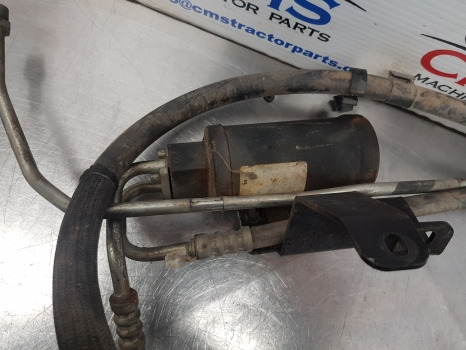 John Deere 6115m. 6m, 6r, Air Conditioning Receiver-dryer Assy Al204865 - A/C part: picture 4 John Deere 6115m. 6m, 6r, Air Conditioning Receiver-dryer Assy Al204865 - A/C part: picture 4