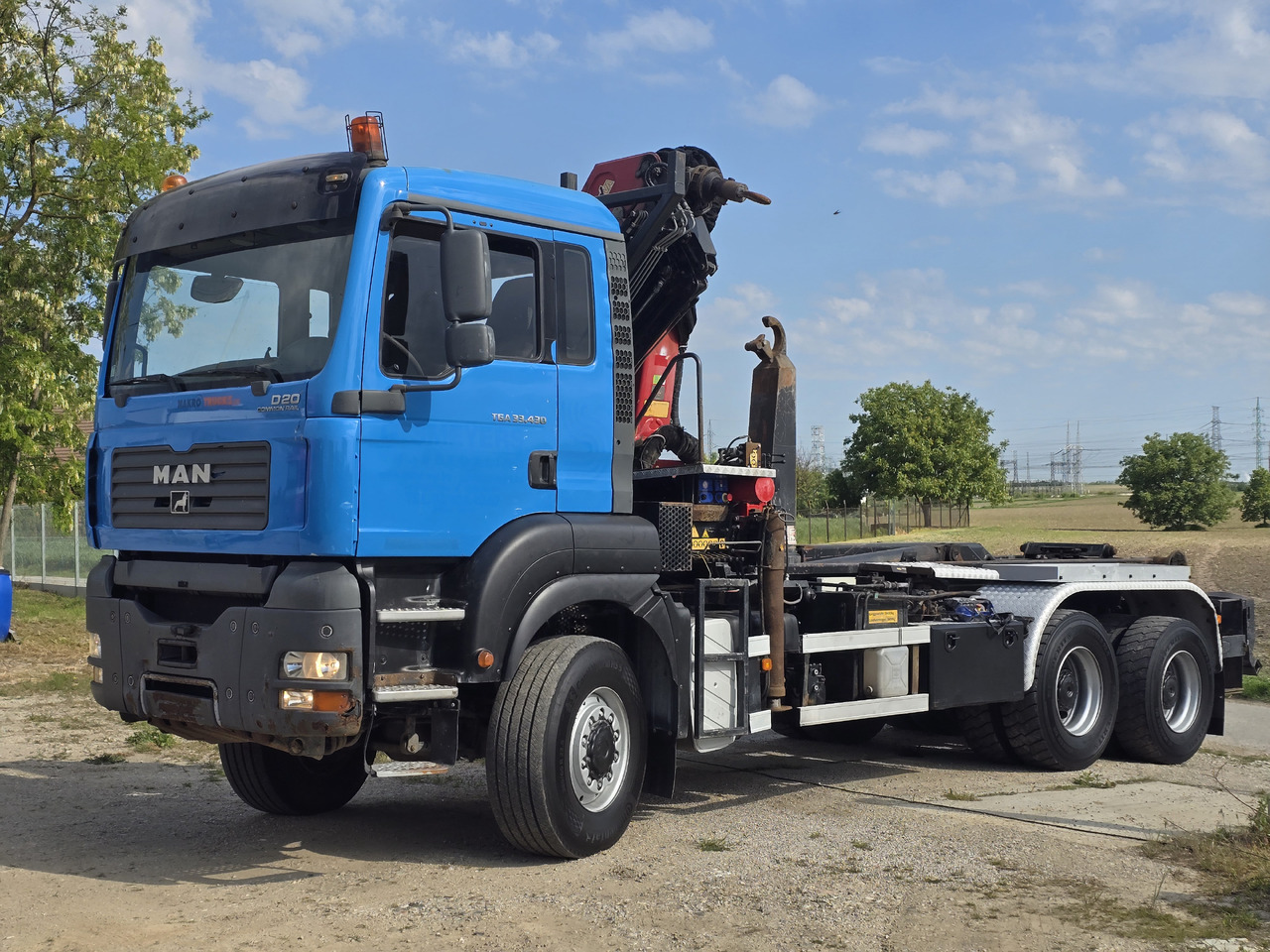 MAN TGA 33.430 6X6 / HMF 1823 K3+REM.CON./ HOOK SYSTEM - Hook lift truck, Crane truck: picture 3 MAN TGA 33.430 6X6 / HMF 1823 K3+REM.CON./ HOOK SYSTEM - Hook lift truck, Crane truck: picture 3