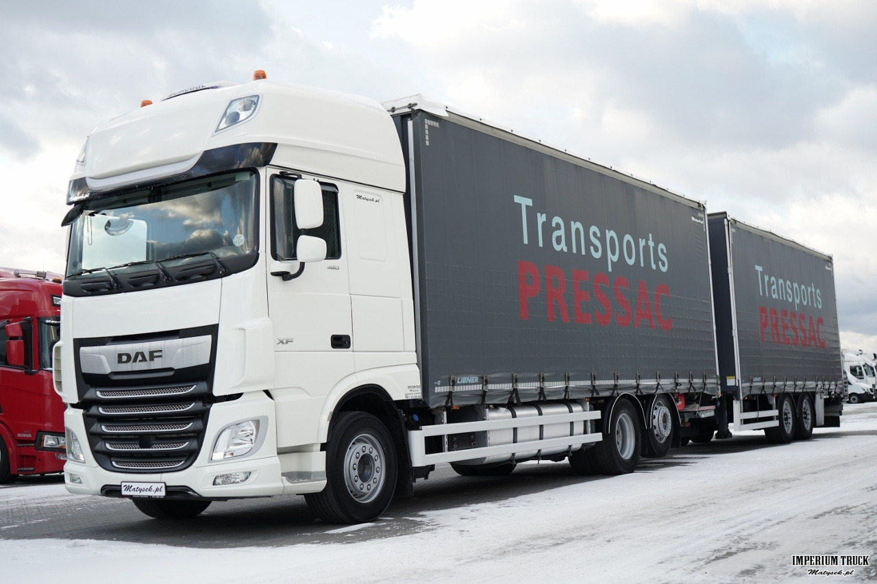 DAF XF 480 / ZESTAW TANDEM / 120 M3 / PRZEJAZDOWY / OŚ PODNOSZONA / OŚ SKRĘTNA / PODŁOGA SZYNA DESKA / WINDA DHOLLANDIA / KLIMA POSTOJOWA / + PRZYCZEPA LECITRAILER / OSIE SAF - Curtain side truck: picture 1 DAF XF 480 / ZESTAW TANDEM / 120 M3 / PRZEJAZDOWY / OŚ PODNOSZONA / OŚ SKRĘTNA / PODŁOGA SZYNA DESKA / WINDA DHOLLANDIA / KLIMA POSTOJOWA / + PRZYCZEPA LECITRAILER / OSIE SAF - Curtain side truck: picture 1