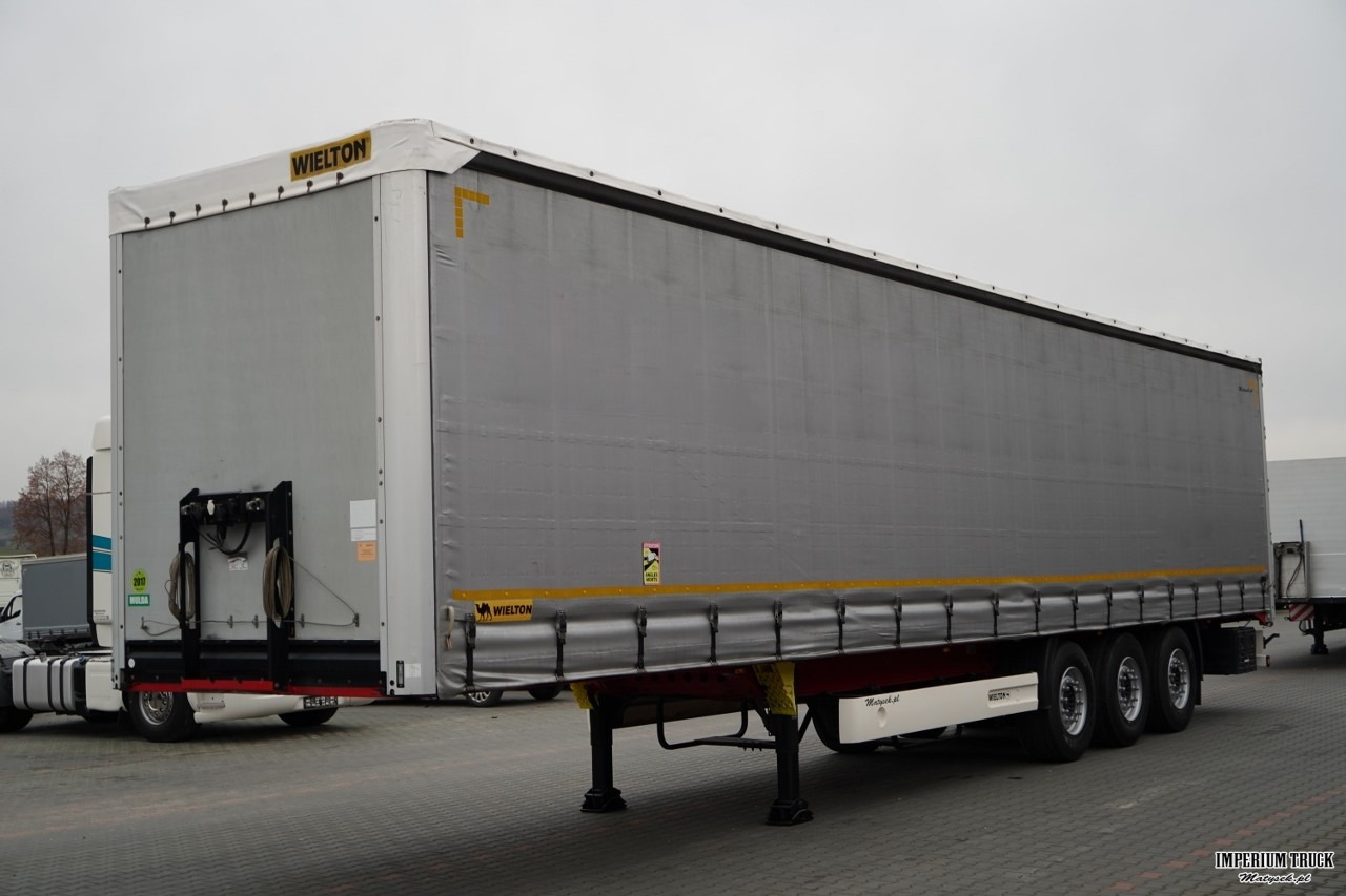 WIELTON / FIRANKA STANDARD / MULDA DO STALI - 9 M / OŚ PODNOSZONA / SAF / MAŁO UŻYWANA - Curtainsider semi-trailer: picture 1 WIELTON / FIRANKA STANDARD / MULDA DO STALI - 9 M / OŚ PODNOSZONA / SAF / MAŁO UŻYWANA - Curtainsider semi-trailer: picture 1