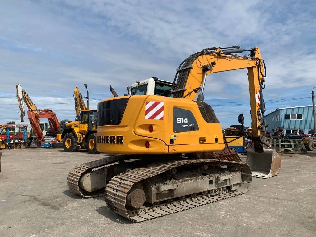 Liebherr R 914 Compact Litronic Liebherr R 914 Compact Litronic - Wheel excavator: picture 4 Liebherr R 914 Compact Litronic Liebherr R 914 Compact Litronic - Wheel excavator: picture 4