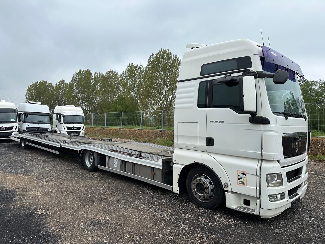MAN TGX 18.360 Flachzug*3er*XXL*Winde*Retarder - Autotransporter truck: picture 1 MAN TGX 18.360 Flachzug*3er*XXL*Winde*Retarder - Autotransporter truck: picture 1