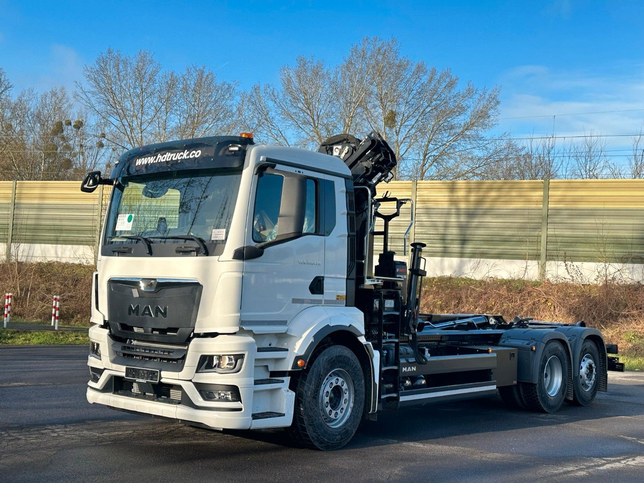 MAN TGS 26.470 6x2 Abrollkipper + Kran Hiab 138-3 - Hook lift truck, Crane truck: picture 2 MAN TGS 26.470 6x2 Abrollkipper + Kran Hiab 138-3 - Hook lift truck, Crane truck: picture 2