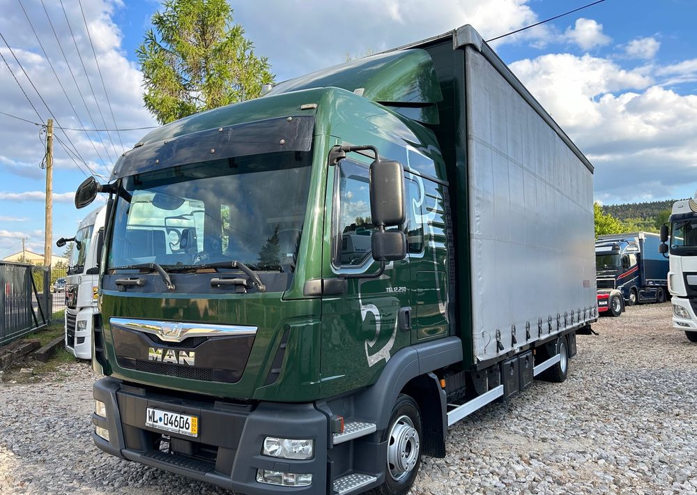 MAN TGL 12.250 GLOB UNIKAT z Niemiec BDF firanka / AUTOMAT HAK / EURO 6 / BDF 7.40 wysoki / MICHELIN 80% - Curtain side truck: picture 3 MAN TGL 12.250 GLOB UNIKAT z Niemiec BDF firanka / AUTOMAT HAK / EURO 6 / BDF 7.40 wysoki / MICHELIN 80% - Curtain side truck: picture 3