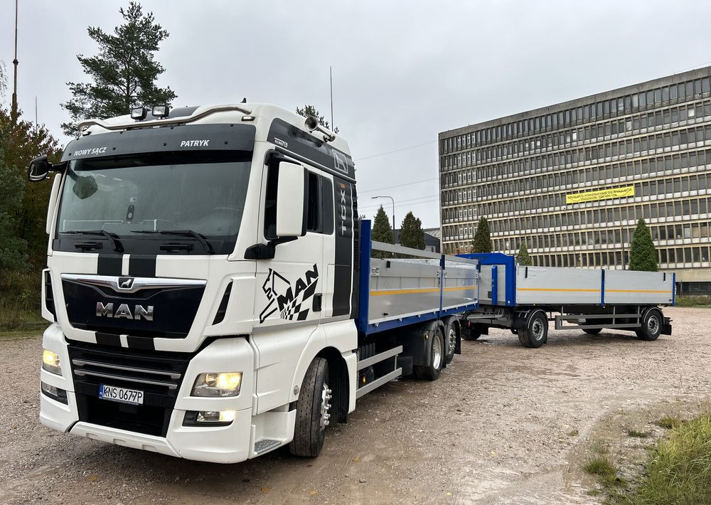 MAN TGX Tandem 1m burty TOP KOMPLET / ALUFELGI / zarejestrowany gotowy do pracy / przyczepa 18t / FULL OPCJA / 26.420 26.460 26.500 26.400 26.440 26.480 26.510 460 500 - Dropside/ Flatbed truck: picture 1 MAN TGX Tandem 1m burty TOP KOMPLET / ALUFELGI / zarejestrowany gotowy do pracy / przyczepa 18t / FULL OPCJA / 26.420 26.460 26.500 26.400 26.440 26.480 26.510 460 500 - Dropside/ Flatbed truck: picture 1