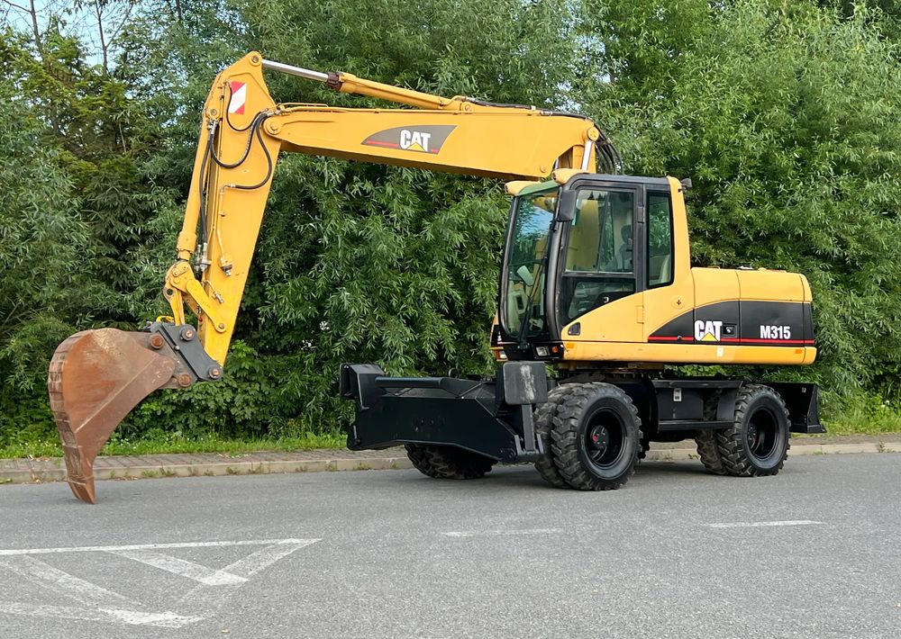 Caterpillar CAT M315C CATERPILLAR SPROWADZONY Bardzo Dobry Stan - Wheel excavator: picture 1 Caterpillar CAT M315C CATERPILLAR SPROWADZONY Bardzo Dobry Stan - Wheel excavator: picture 1